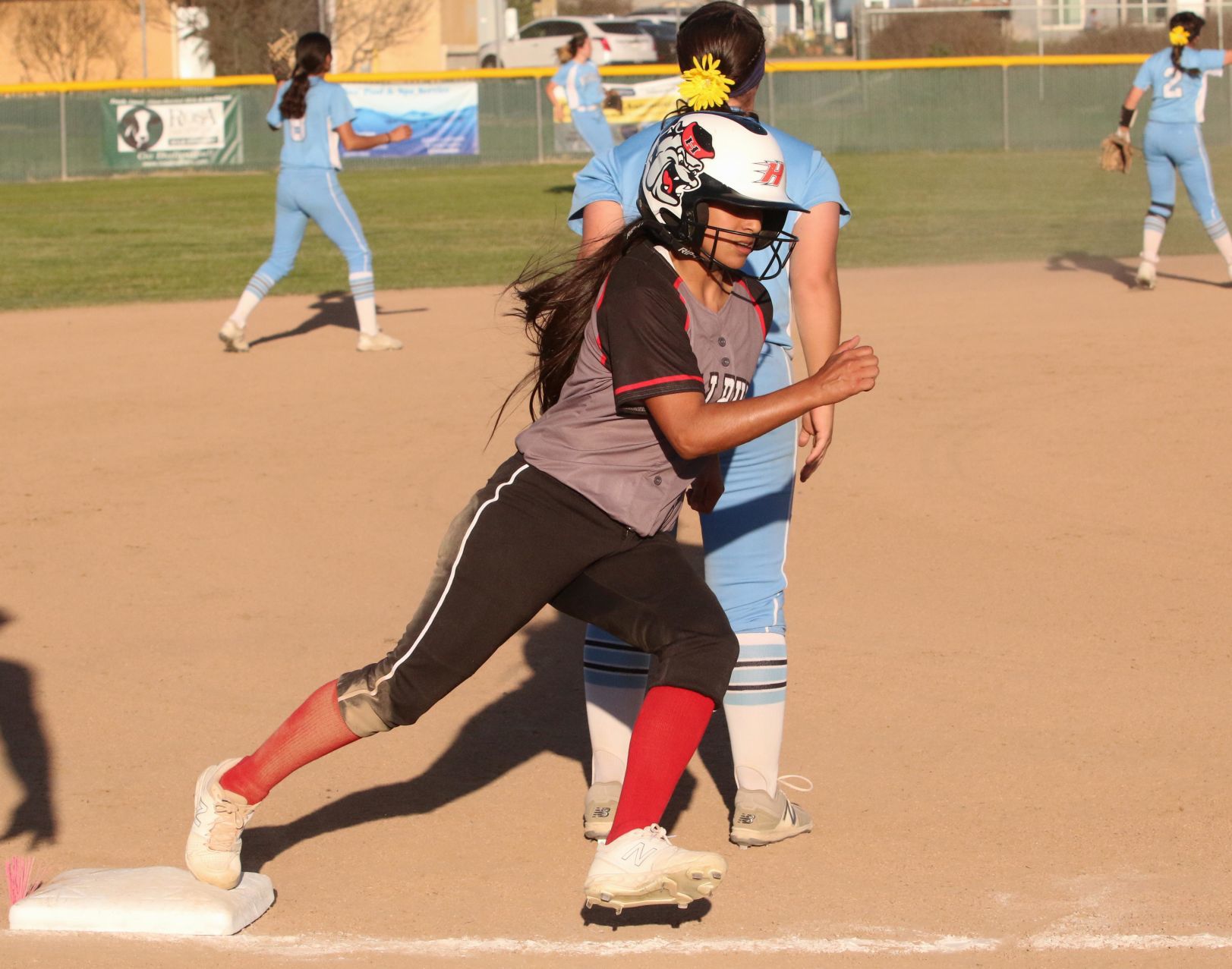 Hanford takes advantage of five Redwood errors, moves into first in WYL